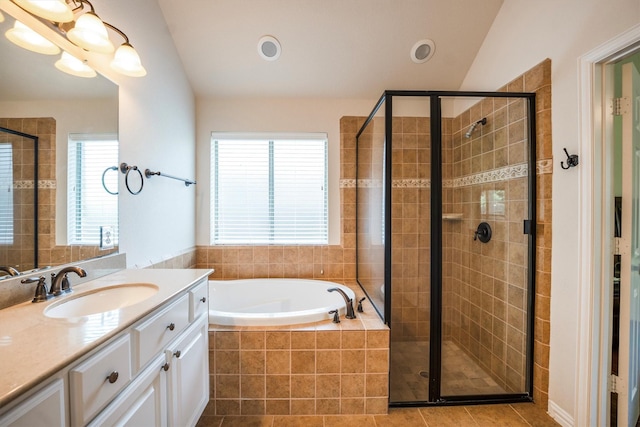 18419 W Willow Oak Bend Dr, Cypress, TX 77433 - bathroom featuring vanity, a garden tub, a shower stall, tile patterned flooring, and lofted ceiling