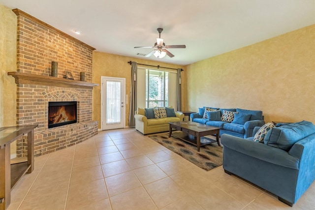 18419 W Willow Oak Bend Dr, Cypress, TX 77433 - living area featuring ceiling fan, light tile patterned floors, and a brick fireplace