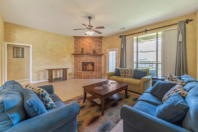 18419 W Willow Oak Bend Dr, Cypress, TX 77433 - living area featuring a ceiling fan and a fireplace
