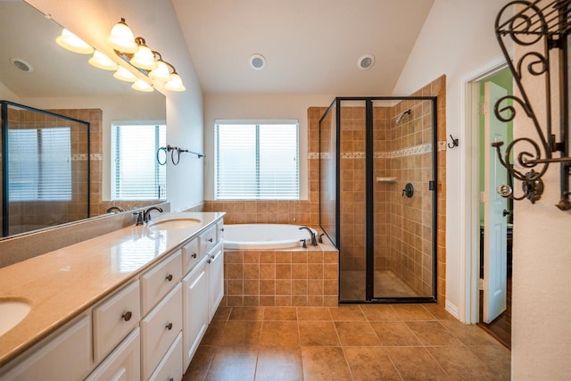 18419 W Willow Oak Bend Dr, Cypress, TX 77433 - full bath with lofted ceiling, a stall shower, double vanity, a bath, and tile patterned flooring