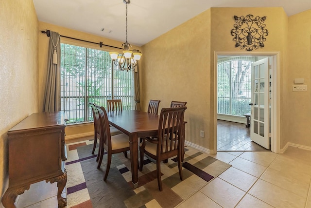 18419 W Willow Oak Bend Dr, Cypress, TX 77433 - dining room with a chandelier and light tile patterned floors