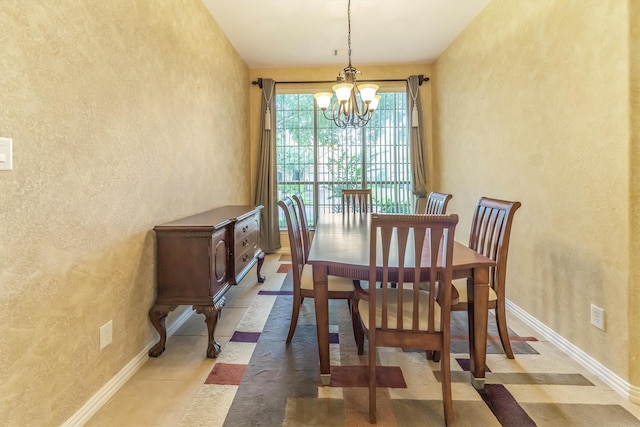 18419 W Willow Oak Bend Dr, Cypress, TX 77433 - dining area with a chandelier and a textured wall