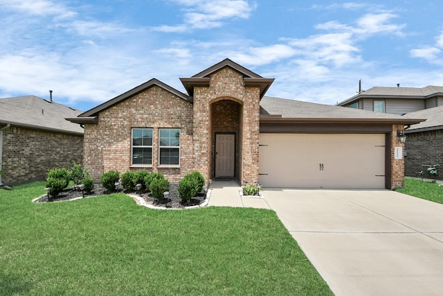 29530 Patricias Way, Katy, TX 77494 - view of front of home with brick siding, an attached garage, driveway, and a front yard