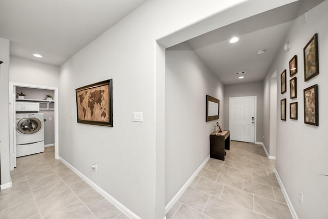 29530 Patricias Way, Katy, TX 77494 - hallway with washer / dryer, light tile patterned flooring, and recessed lighting
