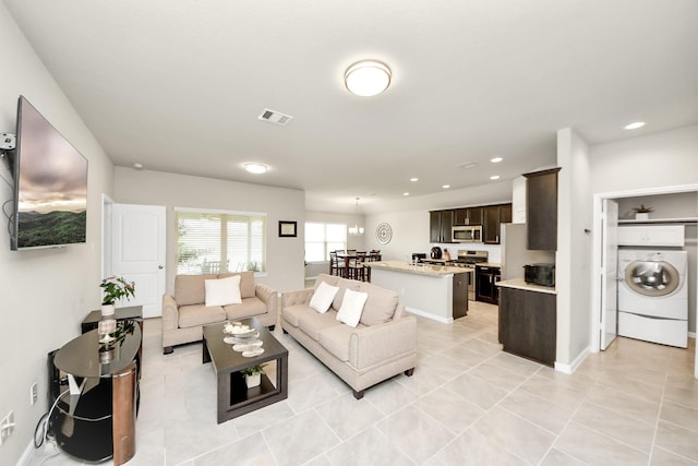 29530 Patricias Way, Katy, TX 77494 - living area with washer / dryer, recessed lighting, and light tile patterned floors