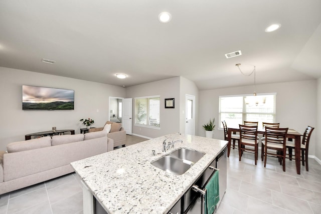 29530 Patricias Way, Katy, TX 77494 - kitchen with light tile patterned flooring, recessed lighting, open floor plan, and pendant lighting