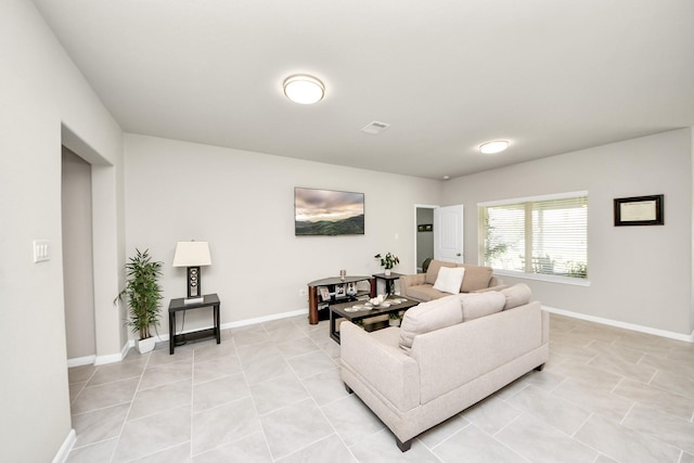 29530 Patricias Way, Katy, TX 77494 - living area featuring light tile patterned floors and baseboards