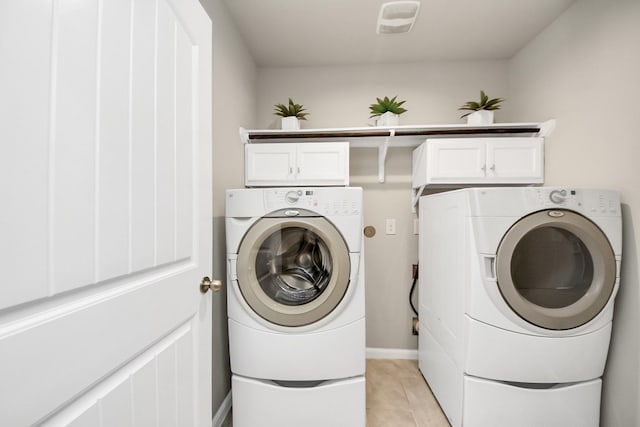 29530 Patricias Way, Katy, TX 77494 - laundry room featuring washing machine and clothes dryer and light tile patterned floors