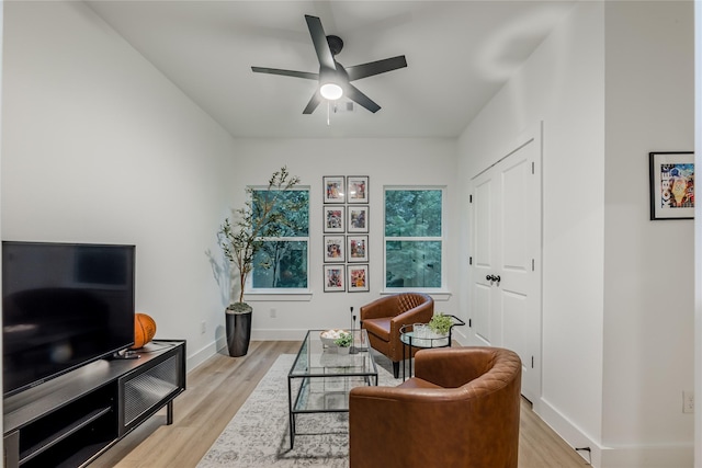 1911 Dewalt St, Houston, TX 77088 - living area featuring light wood-style flooring and a ceiling fan