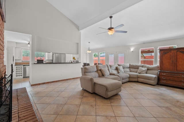 706 Geronimo Ct, Katy, TX 77450 - living area featuring a ceiling fan, light tile patterned flooring, and high vaulted ceiling