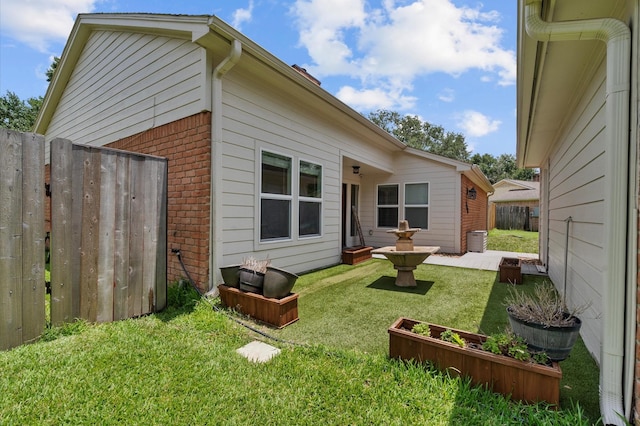 706 Geronimo Ct, Katy, TX 77450 - back of house featuring brick siding