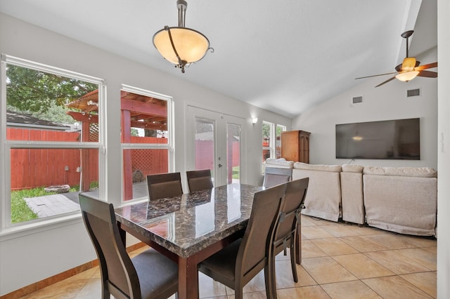 706 Geronimo Ct, Katy, TX 77450 - dining room with vaulted ceiling, light tile patterned flooring, a ceiling fan, and french doors