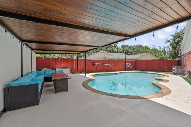 706 Geronimo Ct, Katy, TX 77450 - view of swimming pool featuring an outdoor hangout area, a patio, and a fenced backyard