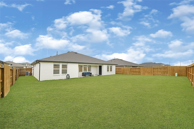 3430 Harper Meadow Ln, Missouri City, TX 77459 - rear view of house with a fenced backyard and a shingled roof