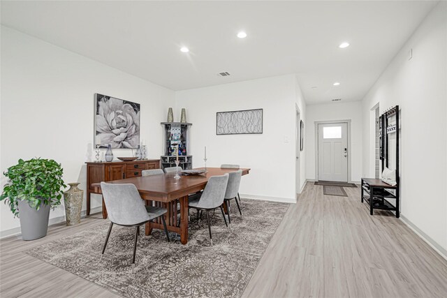 3430 Harper Meadow Ln, Missouri City, TX 77459 - dining room with light wood-type flooring and recessed lighting