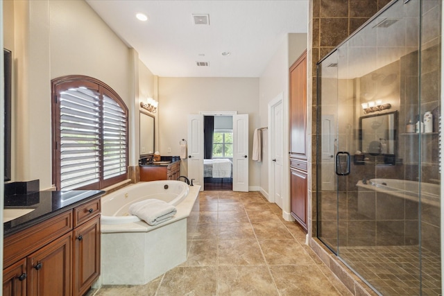 3319 Bridgeberry Ln, Houston, TX 77082 - full bath with vanity, a garden tub, and a stall shower