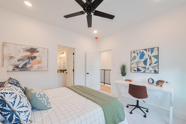 2710 Bostic St, Houston, TX 77093 - bedroom with light colored carpet, an office area, recessed lighting, and ceiling fan
