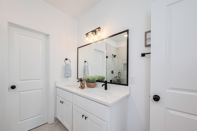 2710 Bostic St, Houston, TX 77093 - bathroom featuring double vanity, a shower stall, and tile patterned flooring