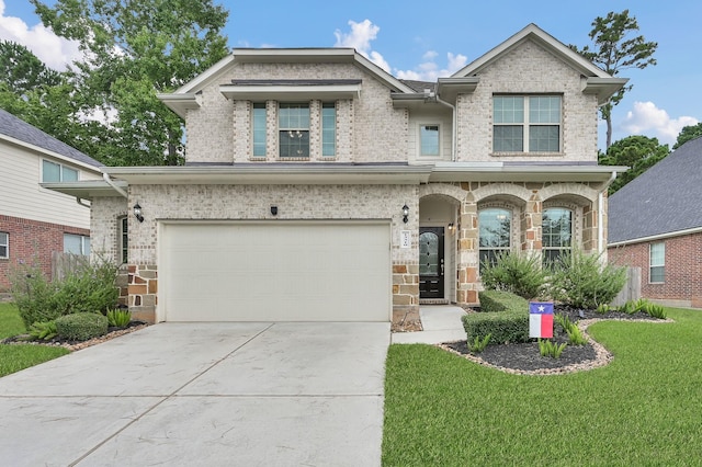13310 Hidden Valley Dr, Montgomery, TX 77356 - view of front facade featuring concrete driveway, a garage, a front yard, and brick siding