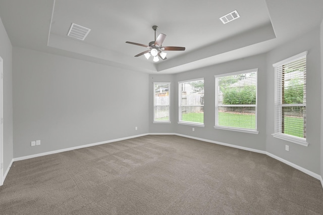 13310 Hidden Valley Dr, Montgomery, TX 77356 - carpeted spare room with a raised ceiling and a ceiling fan