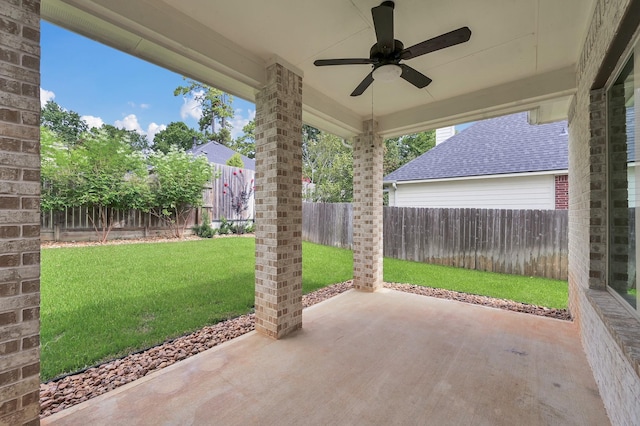 13310 Hidden Valley Dr, Montgomery, TX 77356 - fenced backyard featuring a patio area and a ceiling fan