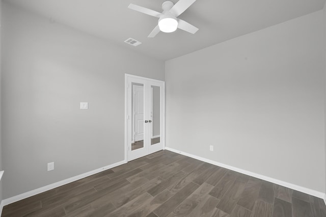 13310 Hidden Valley Dr, Montgomery, TX 77356 - unfurnished room featuring dark wood-style flooring, ceiling fan, and french doors