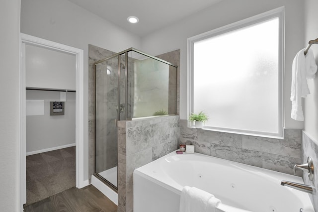 13310 Hidden Valley Dr, Montgomery, TX 77356 - full bathroom featuring plenty of natural light, a shower stall, and a whirlpool tub