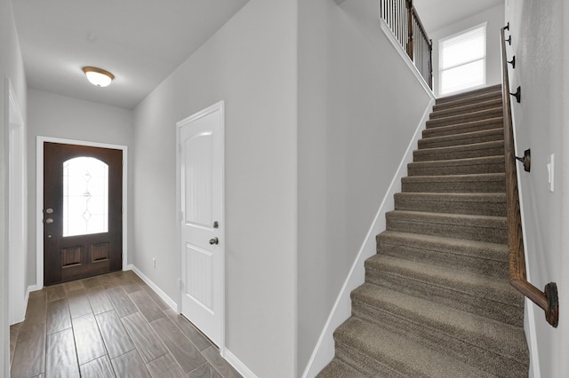 13310 Hidden Valley Dr, Montgomery, TX 77356 - foyer with stairway and wood finished floors