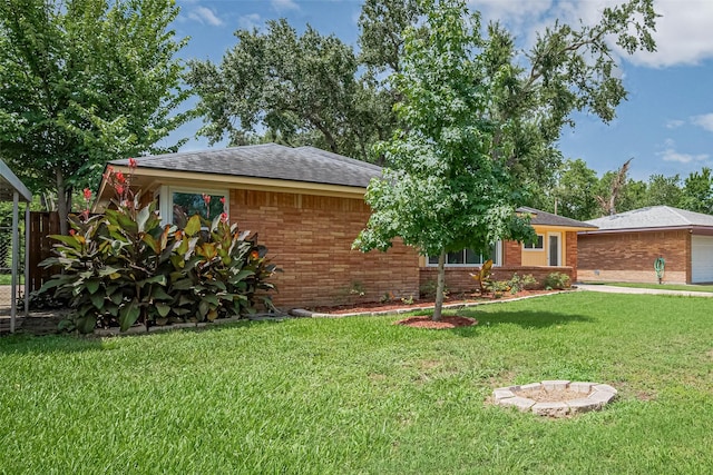 5123 Saxon Dr, Houston, TX 77092 - ranch-style house featuring brick siding and an attached garage