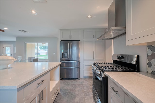 5123 Saxon Dr, Houston, TX 77092 - kitchen featuring stainless steel appliances, extractor fan, light countertops, and recessed lighting