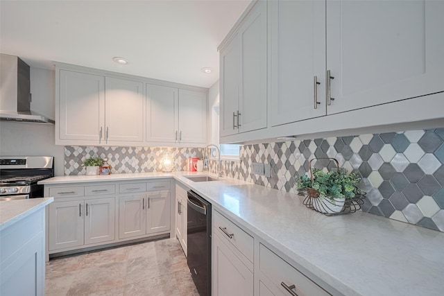 5123 Saxon Dr, Houston, TX 77092 - kitchen with stainless steel range with gas cooktop, wall chimney range hood, dishwasher, light countertops, and decorative backsplash