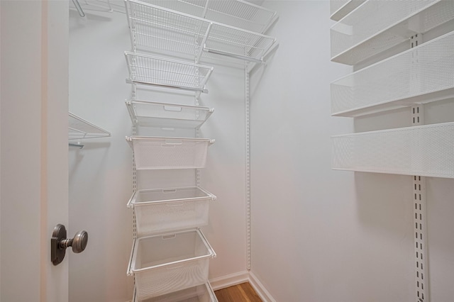 5123 Saxon Dr, Houston, TX 77092 - spacious closet featuring wood finished floors