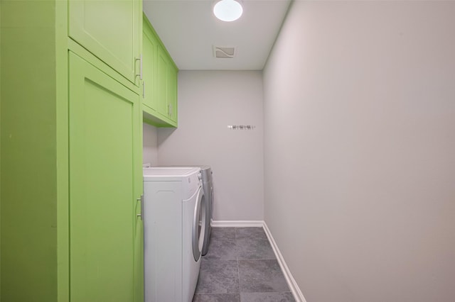 5123 Saxon Dr, Houston, TX 77092 - washroom with washer and dryer and cabinet space