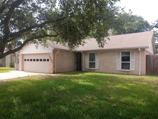 18602 Lippizaner Dr, Cypress, TX 77433 - ranch-style home with brick siding, an attached garage, driveway, and roof with shingles