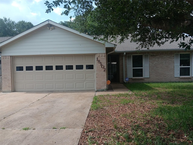 18602 Lippizaner Dr, Cypress, TX 77433 - single story home featuring brick siding, driveway, and a garage