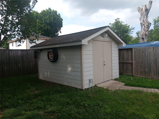 18602 Lippizaner Dr, Cypress, TX 77433 - view of shed with a fenced backyard