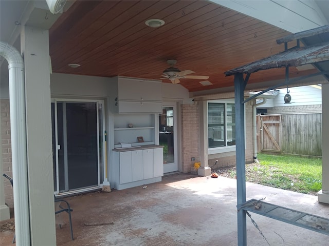 18602 Lippizaner Dr, Cypress, TX 77433 - view of patio / terrace with ceiling fan and a gate