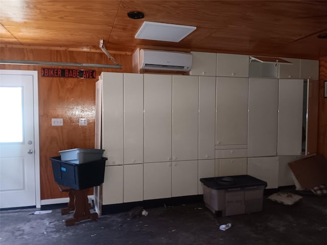 18602 Lippizaner Dr, Cypress, TX 77433 - garage featuring a wall mounted air conditioner, wood walls, and wood ceiling