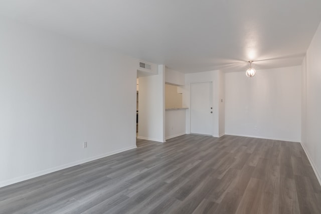 3025 Walnut Bend Ln Unit 37, Houston, TX 77042 - spare room featuring wood finished floors