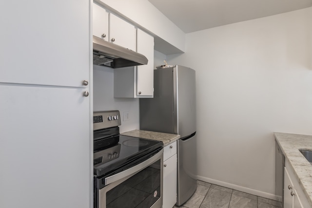 3025 Walnut Bend Ln Unit 37, Houston, TX 77042 - kitchen featuring stainless steel appliances, under cabinet range hood, and white cabinetry