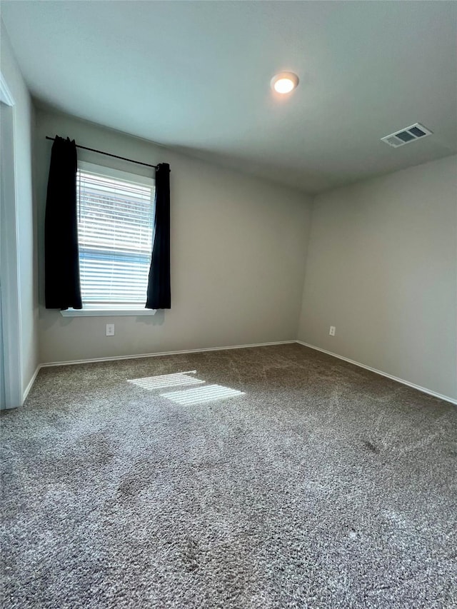 21540 Rustic Elm Dr, New Caney, TX 77357 - carpeted empty room featuring baseboards