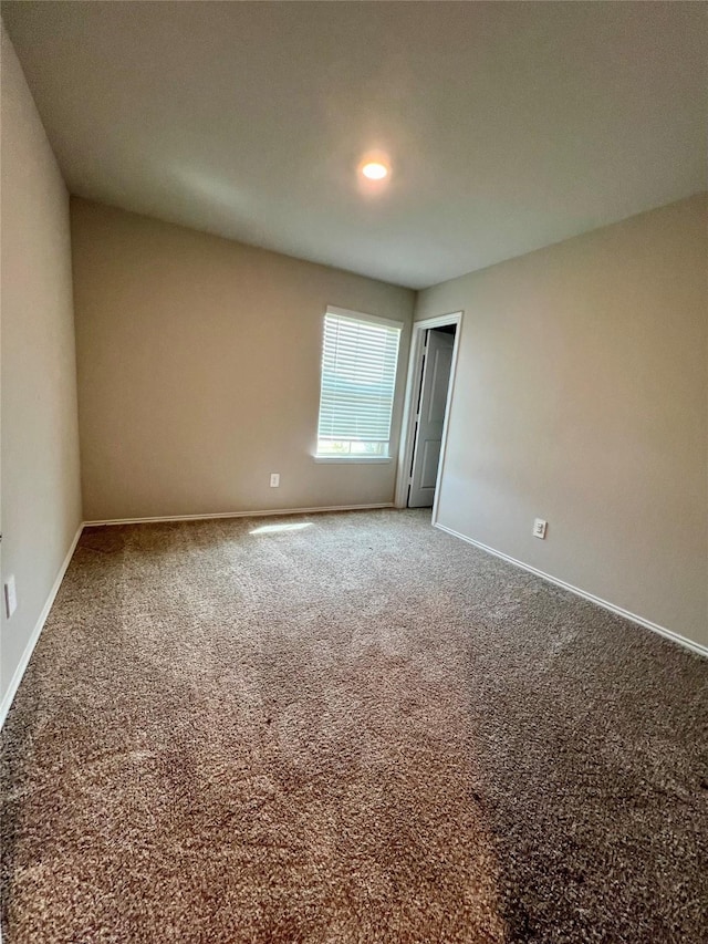 21540 Rustic Elm Dr, New Caney, TX 77357 - empty room with carpet and baseboards