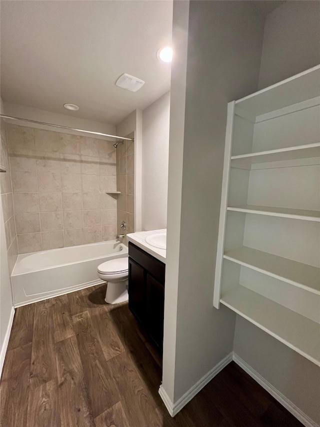21540 Rustic Elm Dr, New Caney, TX 77357 - full bath featuring vanity, wood finished floors, bathtub / shower combination, and recessed lighting