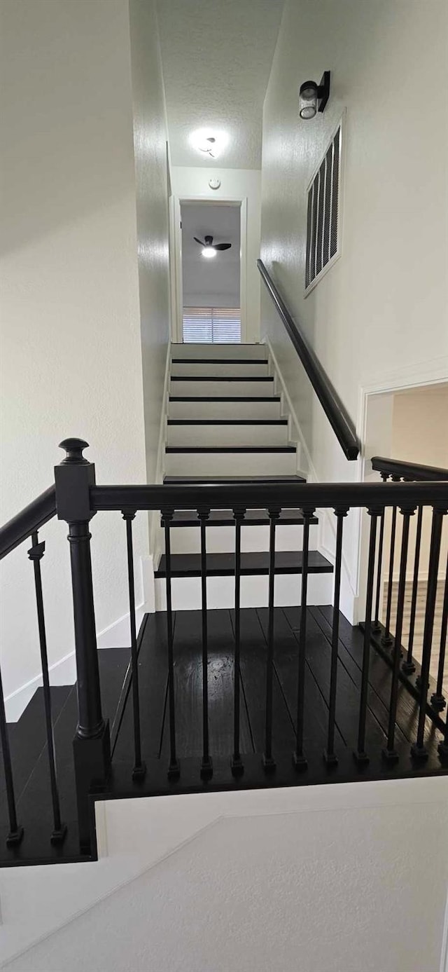 47 W Dansby Dr, Galveston, TX 77551 - stairs with baseboards