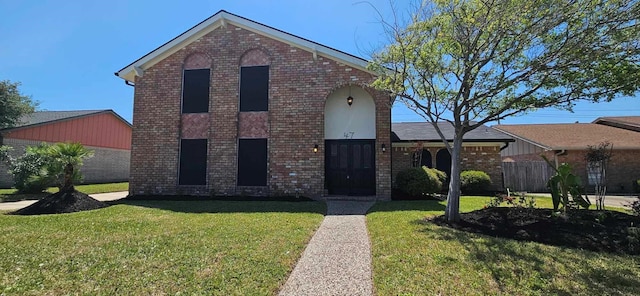 47 W Dansby Dr, Galveston, TX 77551 - view of front facade featuring brick siding