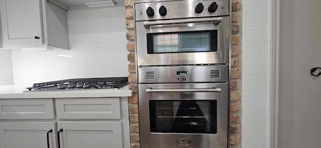 47 W Dansby Dr, Galveston, TX 77551 - kitchen featuring appliances with stainless steel finishes and light countertops