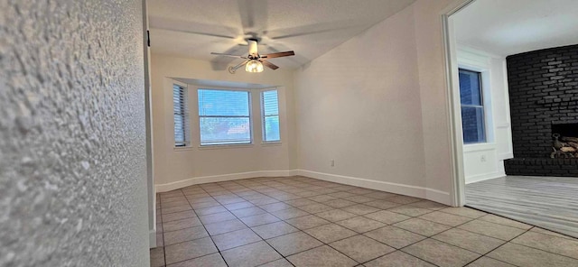 47 W Dansby Dr, Galveston, TX 77551 - spare room featuring light tile patterned floors and a ceiling fan