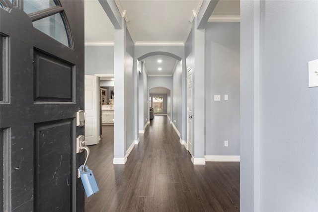 14619 Townsend Ct, Cypress, TX 77429 - foyer entrance featuring arched walkways, dark wood-type flooring, and ornamental molding