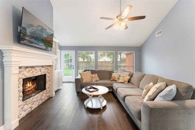 14619 Townsend Ct, Cypress, TX 77429 - living room featuring a tile fireplace, healthy amount of natural light, dark wood-style floors, a ceiling fan, and high vaulted ceiling