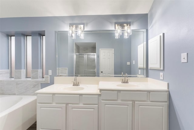 14619 Townsend Ct, Cypress, TX 77429 - full bathroom featuring a stall shower, double vanity, and a bath